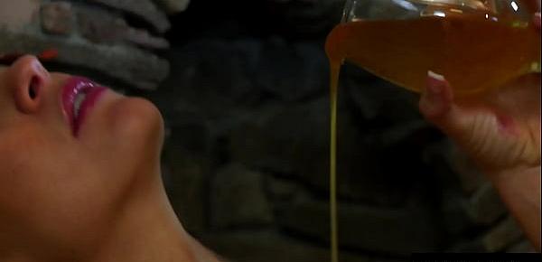  Blonde beauty pours honey on her perfect body as she masturbates